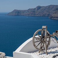 Buy canvas prints of Spinning wheel over ocean on Santorini by Steve Heap