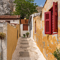 Buy canvas prints of Narrow street in ancient residential district of Anafiotika in A by Steve Heap