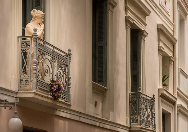 Statue on balcony of ancient residential district of Plaka in At Picture Board by Steve Heap
