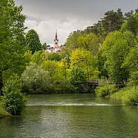 Buy canvas prints of Calm peaceful river in the park near Postojna cave system in Slo by Steve Heap