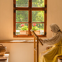 Buy canvas prints of Woman working on embroidery in window alcove by Steve Heap