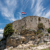 Buy canvas prints of Flag on top of fortress above the Croatian town of Novigrad in I by Steve Heap