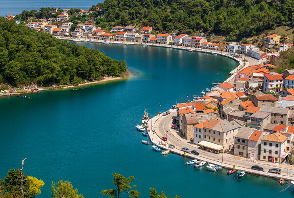 Picturesque small riverside town of Novigrad in Croatia Picture Board by Steve Heap