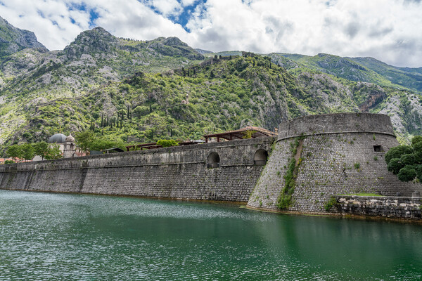 Town walls surround the Old Town of Kotor in Montenegro Picture Board by Steve Heap