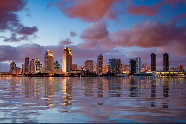 San Diego skyline at dusk reflected in sea Picture Board by Steve Heap