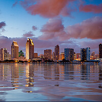 Buy canvas prints of San Diego skyline at dusk reflected in sea by Steve Heap