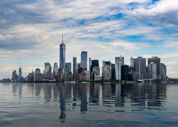 Panorama of Manhattan with calm artificial water Picture Board by Steve Heap
