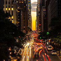 Buy canvas prints of Manhattanhenge when the sun sets along 42nd street in NY by Steve Heap