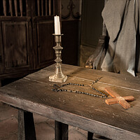 Buy canvas prints of Ancient table with candle, rosary and cross in priest room by Steve Heap