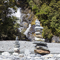 Buy canvas prints of Stone Piles at Fantail Falls, New Zealand by Jackie Davies