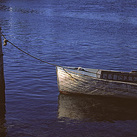 Buy canvas prints of Moored dinghy by David Bigwood