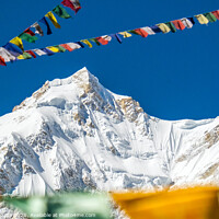 Buy canvas prints of Manaslu and prayer flags by geoff shoults