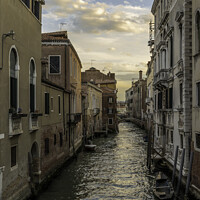 Buy canvas prints of Typical Venetian canal, early in the morning.  by Gary Parker