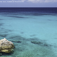 Buy canvas prints of A tropical ocean, with a crystal clear, turquoise sea.  by Gary Parker