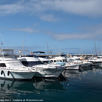 Buy canvas prints of Boats and yachts in a harbour in Tenerife by Gary Parker