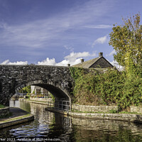 Buy canvas prints of A stone bridge across the Monmouthshire and Brecon Canal. by Gary Parker