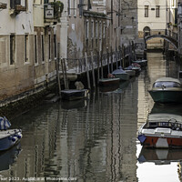 Buy canvas prints of Typical Venetian canal, early in the morning. Venice, Italy.  by Gary Parker