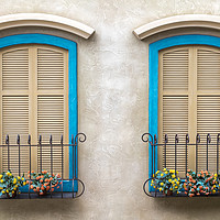 Buy canvas prints of Two quaint windows, with bright blue frames by Gary Parker