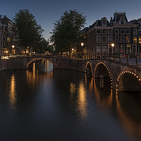 Buy canvas prints of Amsterdam canal and bridge, at dusk.  by Gary Parker