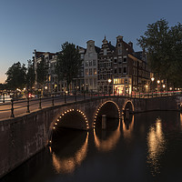Buy canvas prints of Amsterdam canal and bridge, at dusk.  by Gary Parker
