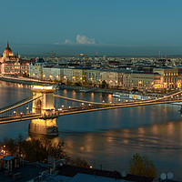 Buy canvas prints of City lights of the Danube and Budapest at sunset, by Gary Parker