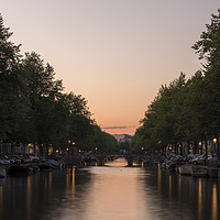 Buy canvas prints of Sunset, looking down a canal in Amsterdam. by Gary Parker