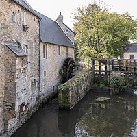 Buy canvas prints of A watermill and a lock in Bayeux (France). by Gary Parker