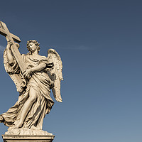 Buy canvas prints of A large, stone statue of an angel, rome by Gary Parker