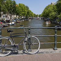 Buy canvas prints of A single bicycle in Amsterdam by Gary Parker