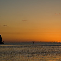 Buy canvas prints of A sailboat , sailing past a tropical sunset	  by Gary Parker