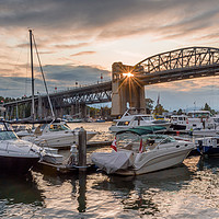 Buy canvas prints of Sunburst through Burrard Bridge, Vancouver, Canada by Gary Parker