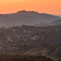 Buy canvas prints of Sunset over the Hollywood Hills, Los Angeles. by Gary Parker