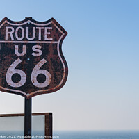 Buy canvas prints of Route 66 sign, set against a clear blue sky by Gary Parker