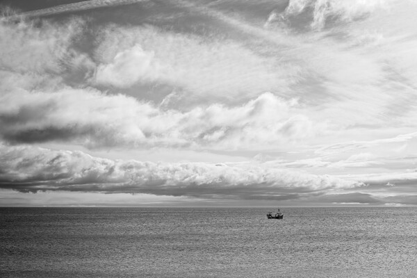 Lone Boat Under Cloudy Sky Picture Board by Rob Cole