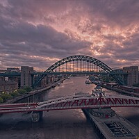 Buy canvas prints of Sunrise Over Newcastle's Iconic Bridges by Rob Cole