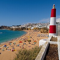 Buy canvas prints of Albufeira Lighthouse Beach View by Rob Cole