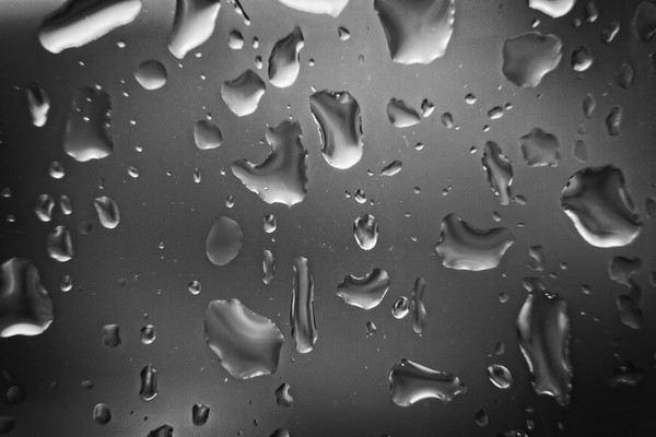 Raindrops Close-up on a Glass Window Picture Board by Rob Cole