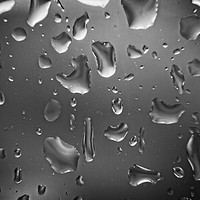 Buy canvas prints of Raindrops Close-up on a Glass Window by Rob Cole