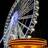 Buy canvas prints of Ferris wheel and Carousel by Gwil Roberts