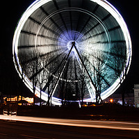 Buy canvas prints of Ferris wheel in motion by Gwil Roberts