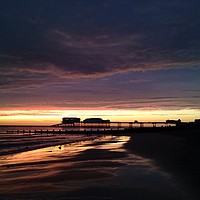Buy canvas prints of Sunrise over cromer pier by Dan White