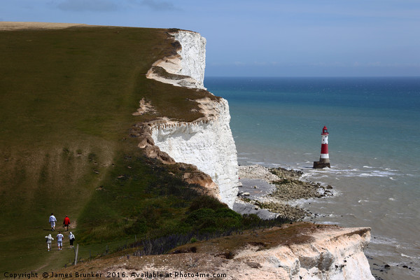 Hikers on the South Downs Way near Beachy Head Picture Board by James Brunker