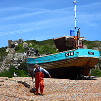 Buy canvas prints of Fisherman at work Hastings East Sussex by James Brunker
