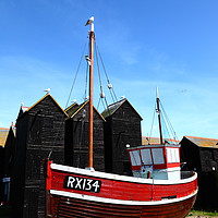 Buy canvas prints of Fishing boat and historic net shops Hastings by James Brunker