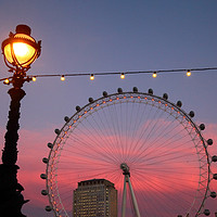 Buy canvas prints of Street Lamp and Millennium Wheel at Sunset by James Brunker