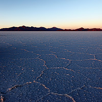 Buy canvas prints of Sunrise Over Salar de Uyuni Salt Flats Bolivia by James Brunker