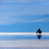 Buy canvas prints of Motorbike Trip Across the Salar de Uyuni Bolivia by James Brunker