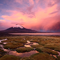 Buy canvas prints of Stormy Sunset and Parinacota Volcano Chile by James Brunker