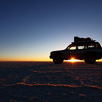 Buy canvas prints of Driving Across the Salar de Uyuni at Dawn Bolivia by James Brunker