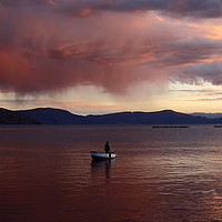 Buy canvas prints of Stormy Sunset and Fisherman on Lake Titicaca by James Brunker
